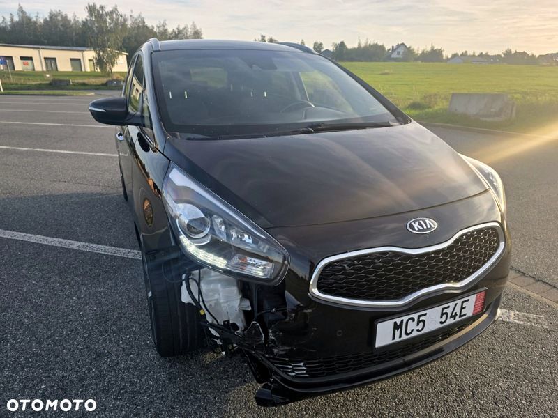 Kia Carens - 4