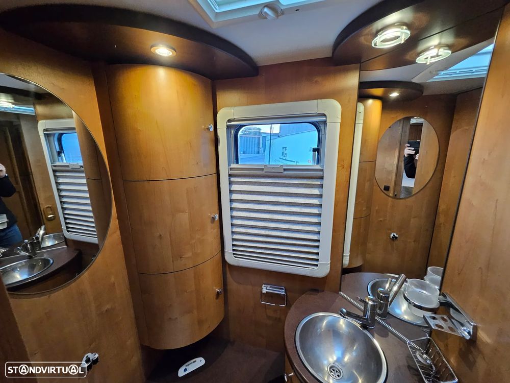 Rapido Le Randonneur 9097F CHASSI AL-KO Cama transversal + BASCULANTE - 48