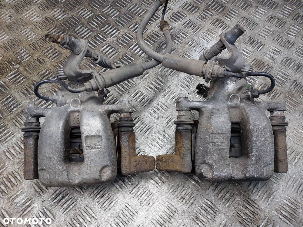 TARCZE HAMULCOWE TYŁ + KLOCKI + ZACISKI VOLKSWAGEN JETTA V - 6