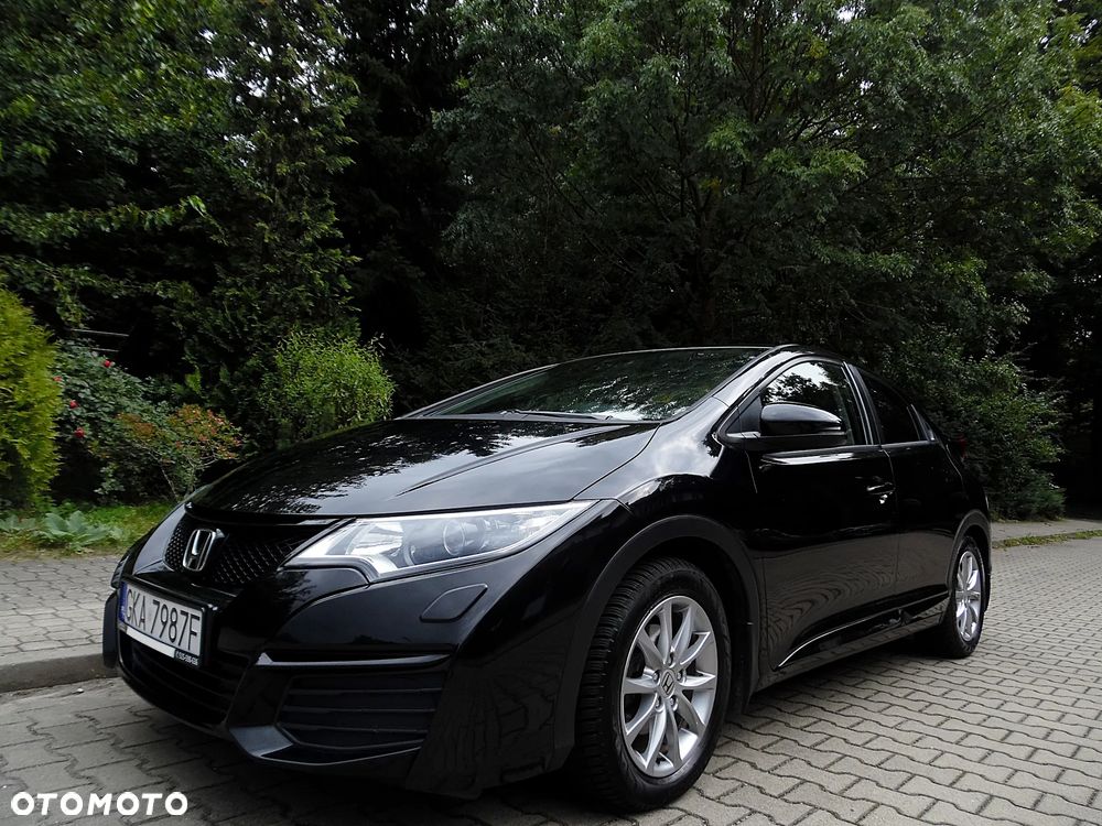 Honda Civic 1.4 i-VTEC Sport Black Edition - 1