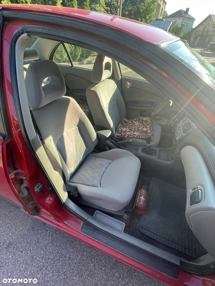 Nissan Almera 1.8 Comfort High - 4