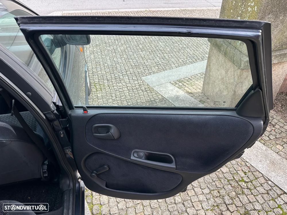 Opel Astra 1.4i 16V Sport - 19