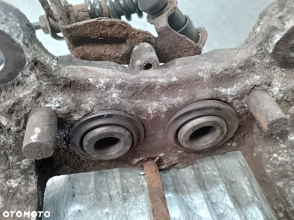 ZACISK HAMULCOWY LEWY TYŁ PORSCHE CAYENNE 3.2 V6 - 4