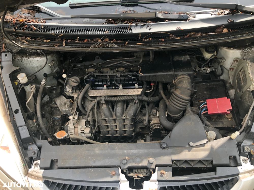 Dezmembrez Mitsubishi Colt 4 usi gri argintiu benzina cutie automata 2006 - 7