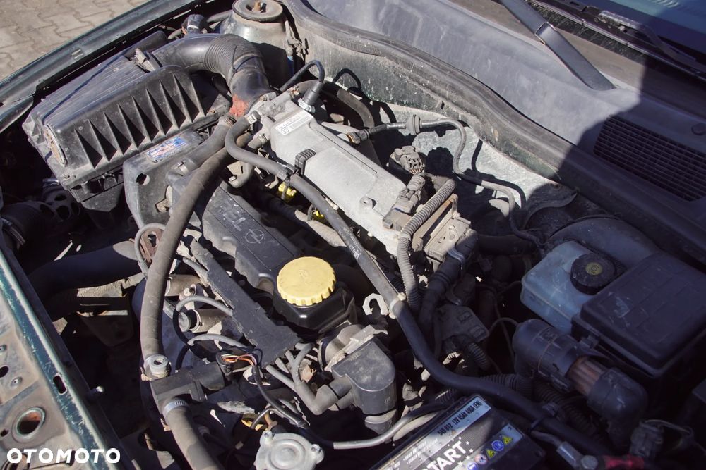 Auto na części - Opel Astra G II 1.6 8V 84 KM Z16SE F13 42U 2001R Silnik Skrzynia Drzwi Maska Zderzak Błotnik Klapa Lusterko Lampa Klamka Szyba Deska Kokpit Sterownik Moduł Czujnik Licznik Panel Kierownica - 18