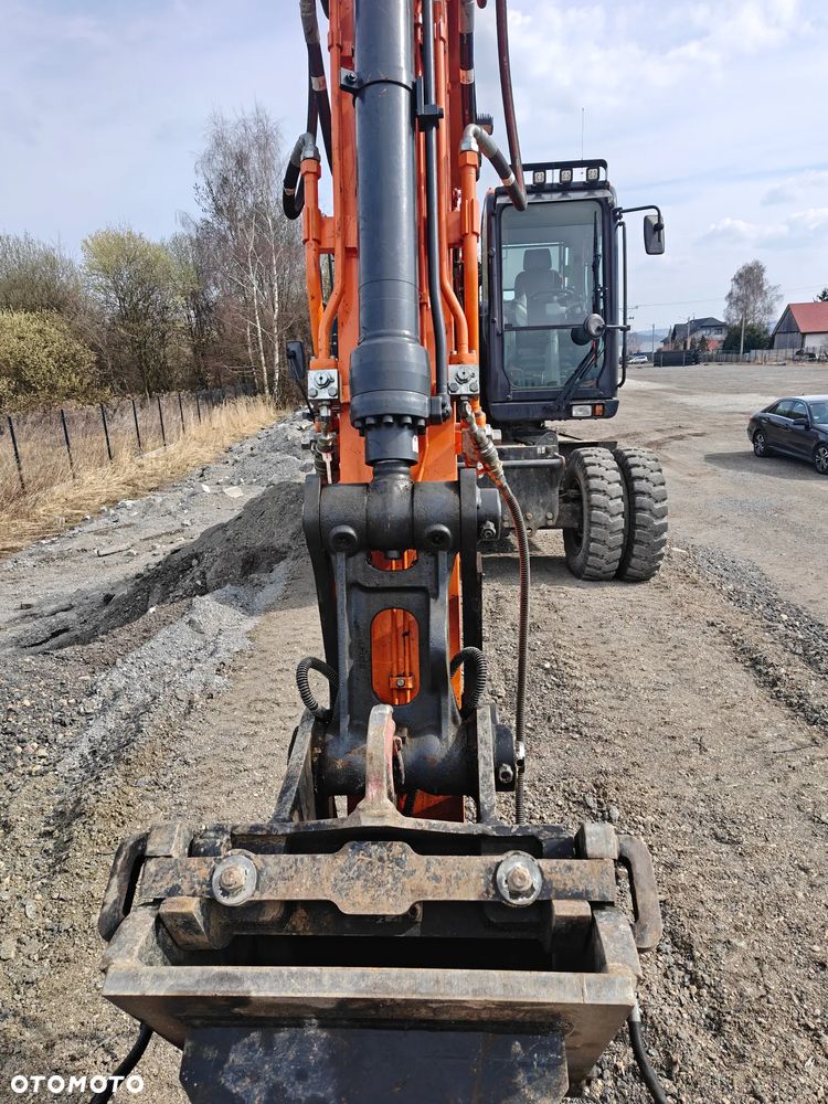Doosan DX140W - 12
