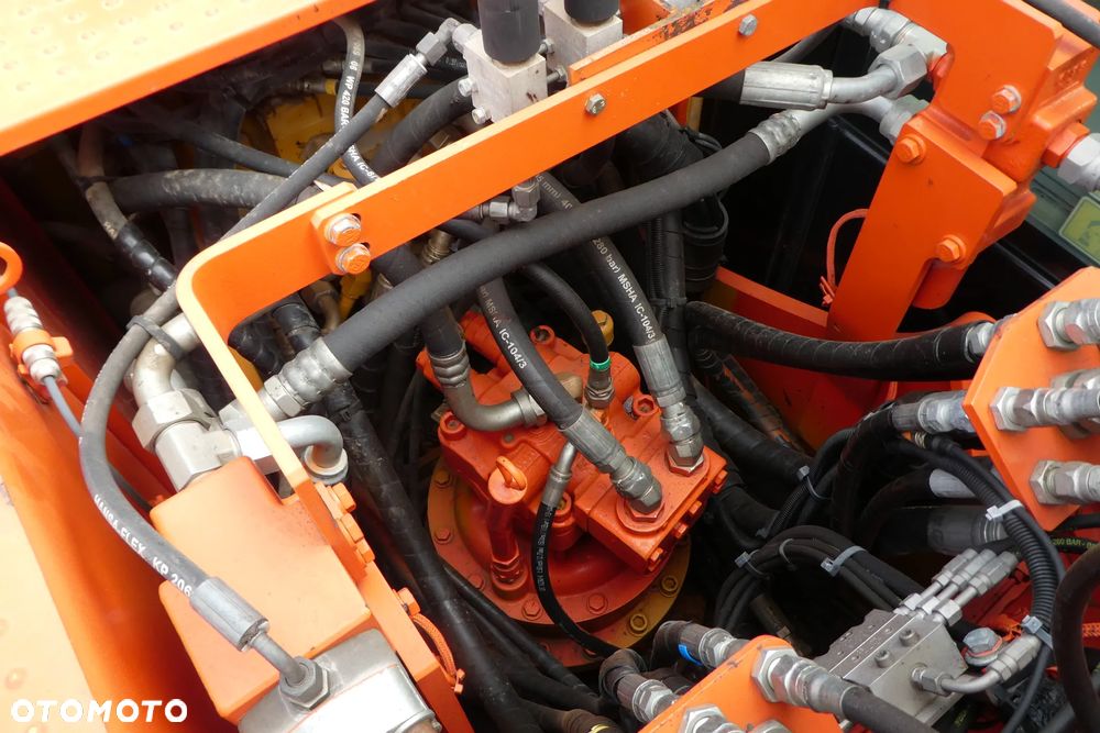 Caterpillar M 318F Z NIEMIEC TRZY ŁYŻKI - 22