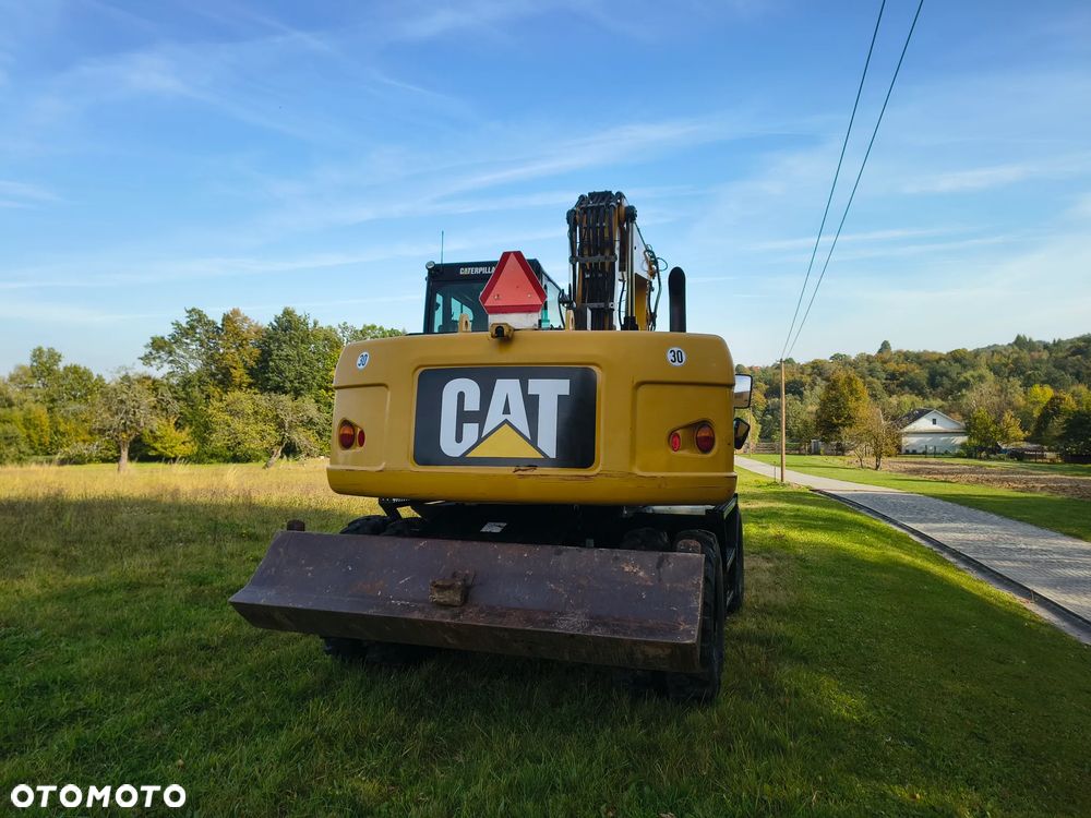 Caterpillar M313D - 10
