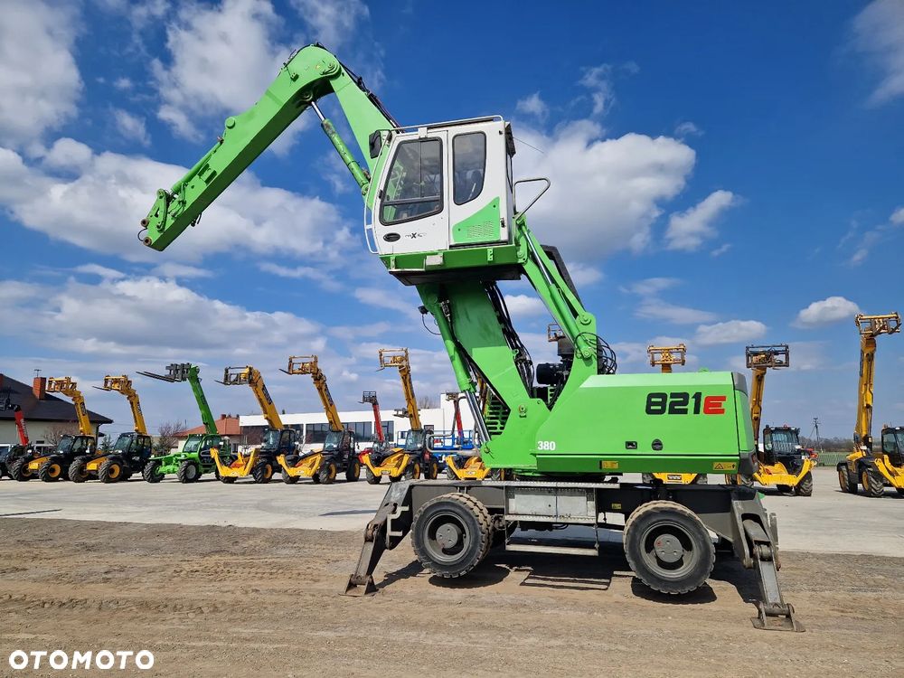 Sennebogen 821E jak FUCHS CAT M500 - 7