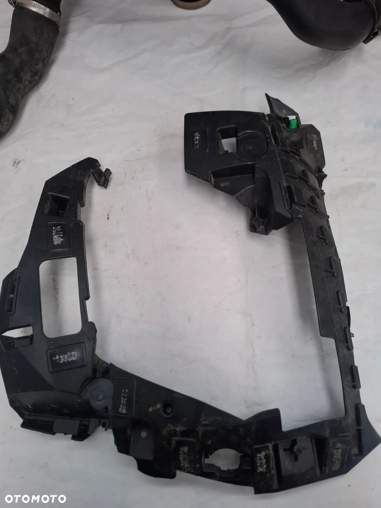 Peugeot 208 Wspornik zderzaka przedni 9855781280 - 2