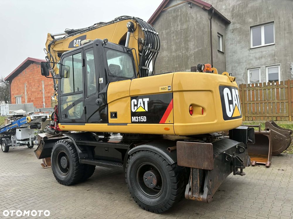 Caterpillar M 315D ROTOTILT SZCZYPCE PODPORY - 4
