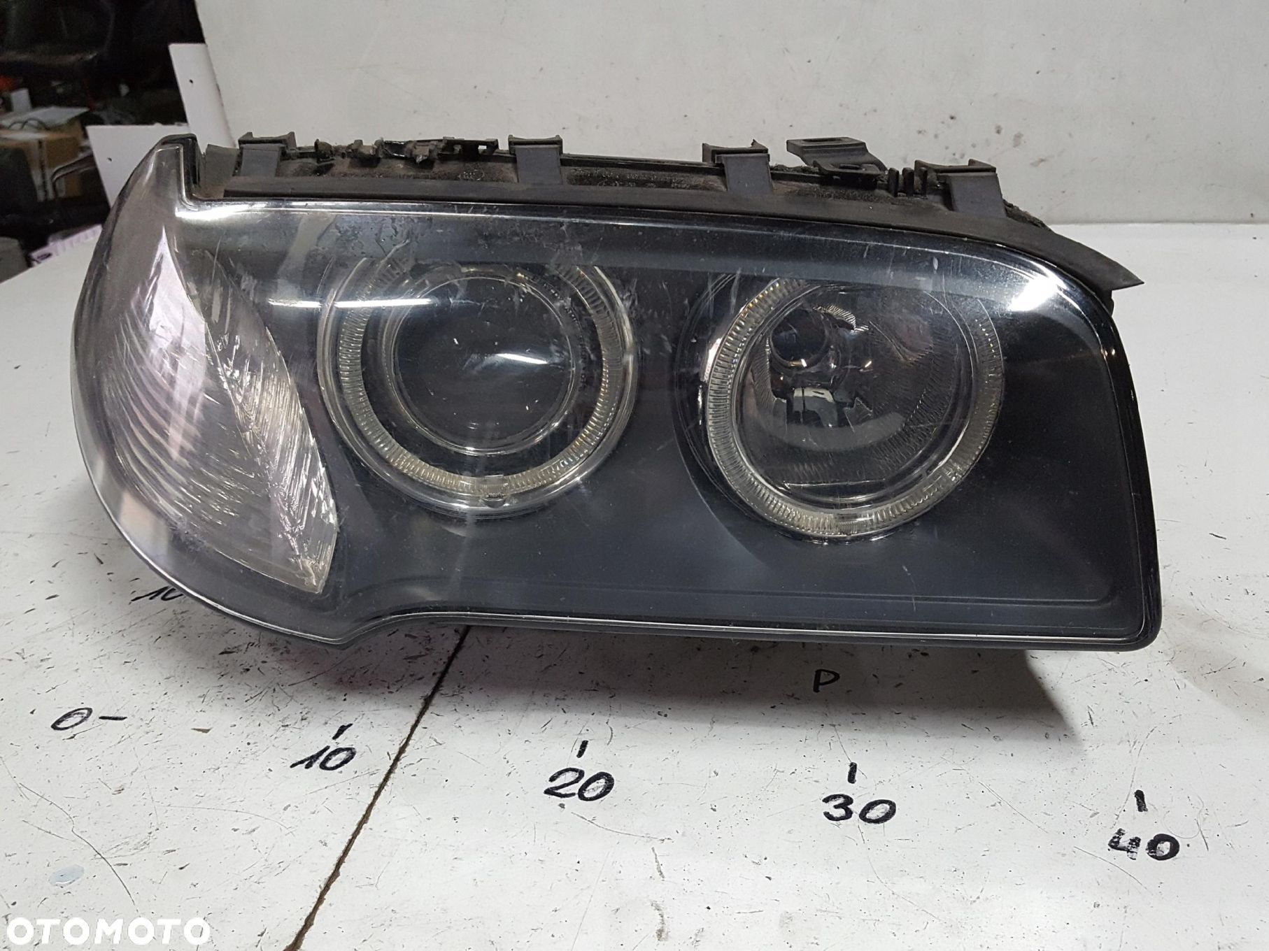 BMW X3 E83 LIFT 06-10r LAMPA XENON PRAWA PRZÓD EUROPA 7162194 - 1