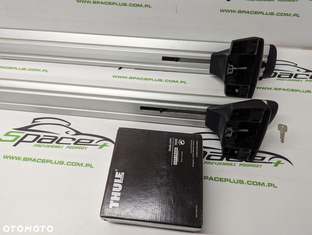 Bagażnik dachowy Thule: belki 711200 + Stopy 7106 + kit - 6