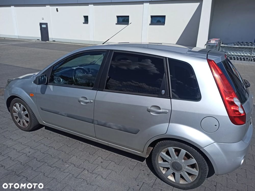 Ford Fiesta 1.4 Ghia - 4