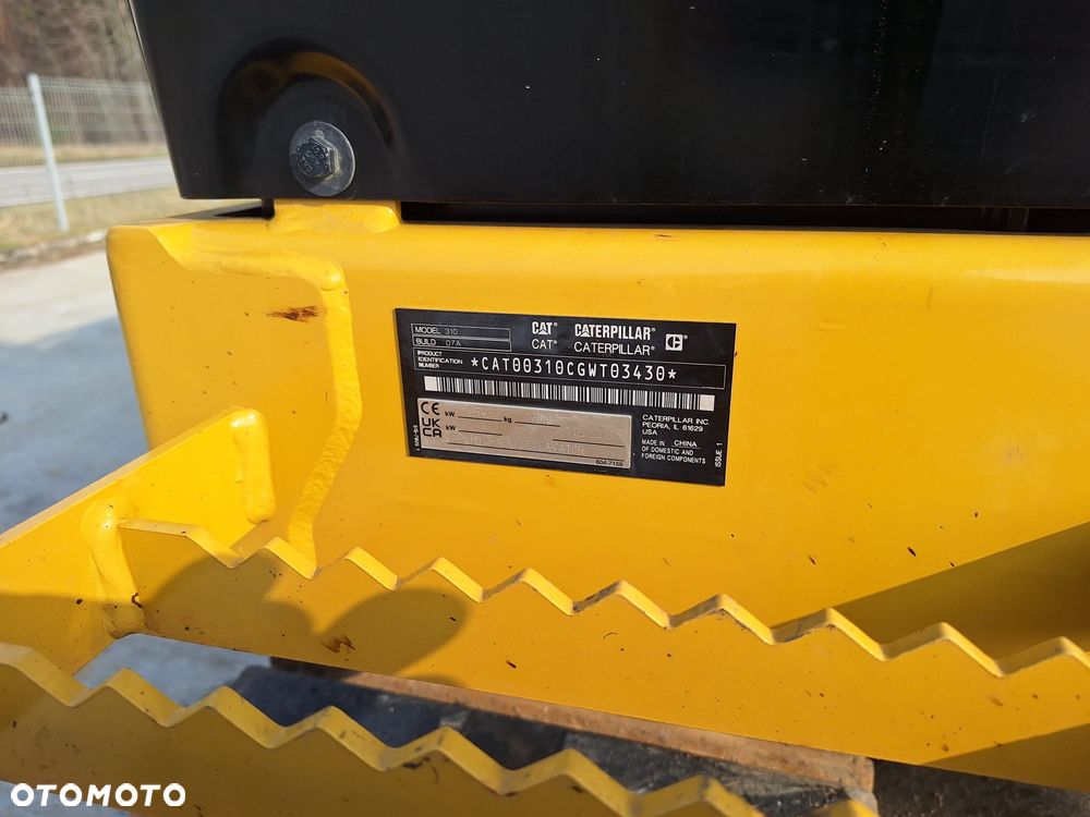 Caterpillar 310 - 12