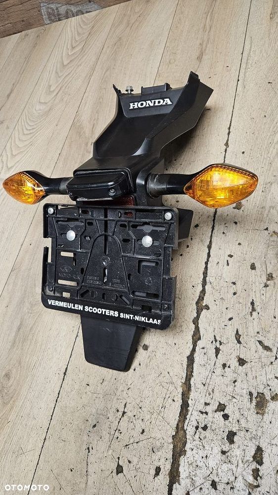 Uchwyt tablicy kierunkowskazy Honda Grom 125 - 2