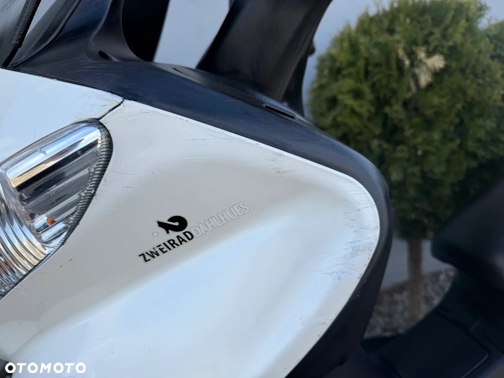 Suzuki Burgman - 32