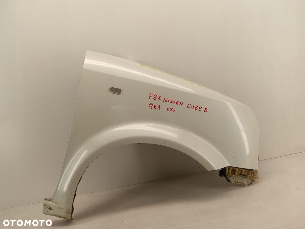 BŁOTNIK PRAWY PRZEDNI PRZÓD NISSAN CUBE II 02-07 QX1 - 1