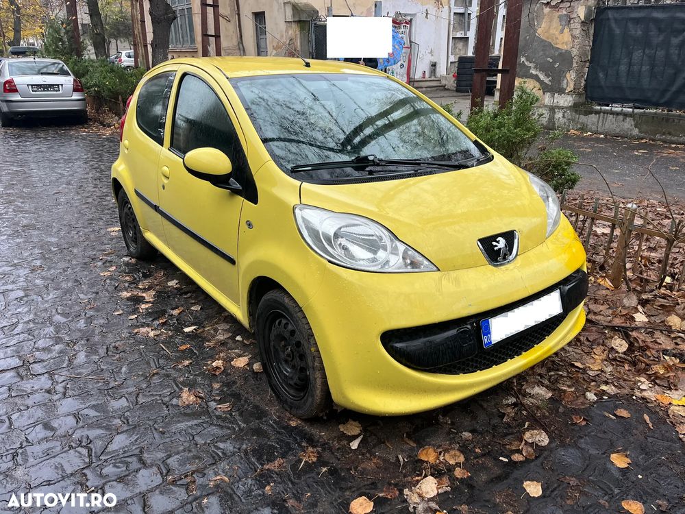 Dezmembrez Peugeot 107 1.0 benzina 2006 galben cu 4 usi