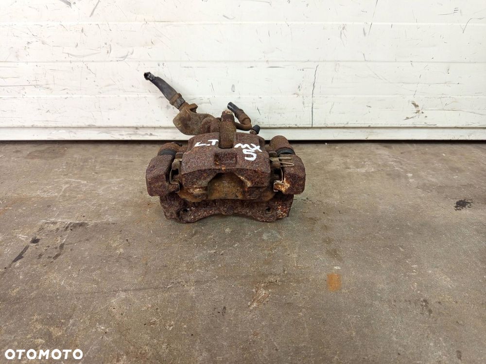 ZACISK HAMULCA LEWY TYŁ LEWY TYLNY MAZDA MX5 MX-5 II NB