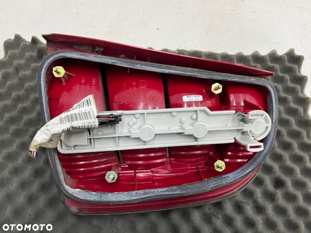 Lampa Skoda Fabia I 6y HB 99-08r. LEWA tylna w błotnik EUROPA EU oryginalna lewy tył 6y6945095b - 8