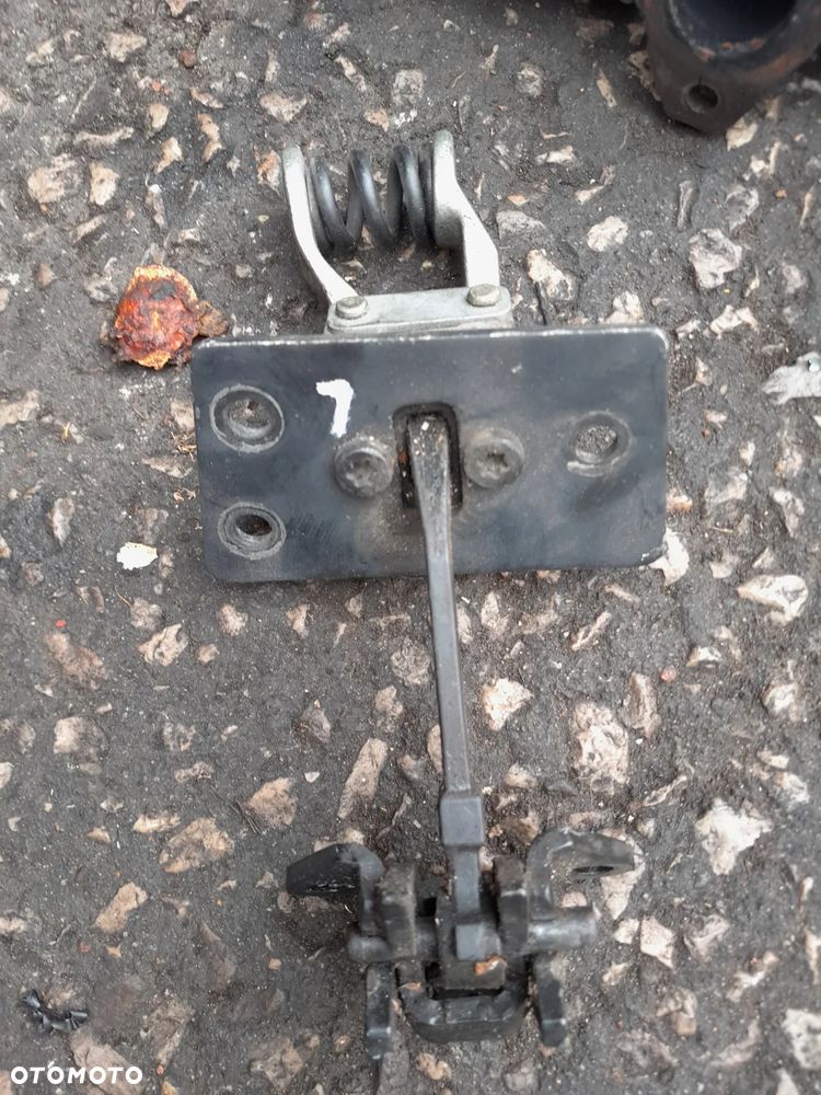 Ogranicznik lewe drzwi VW T5 - 1