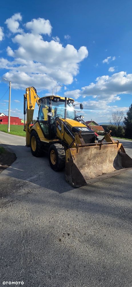 Caterpillar 428 F - 4