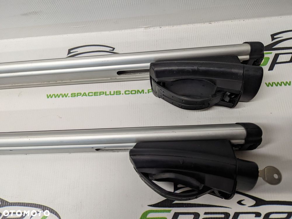 Bagażnik dachowy bazowy na otwarte relingi Thule 775 aerobar 120cm z napisem Renault. - 6