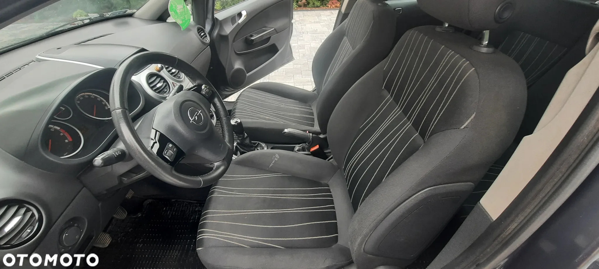 Opel Corsa 1.2 16V Enjoy - 8