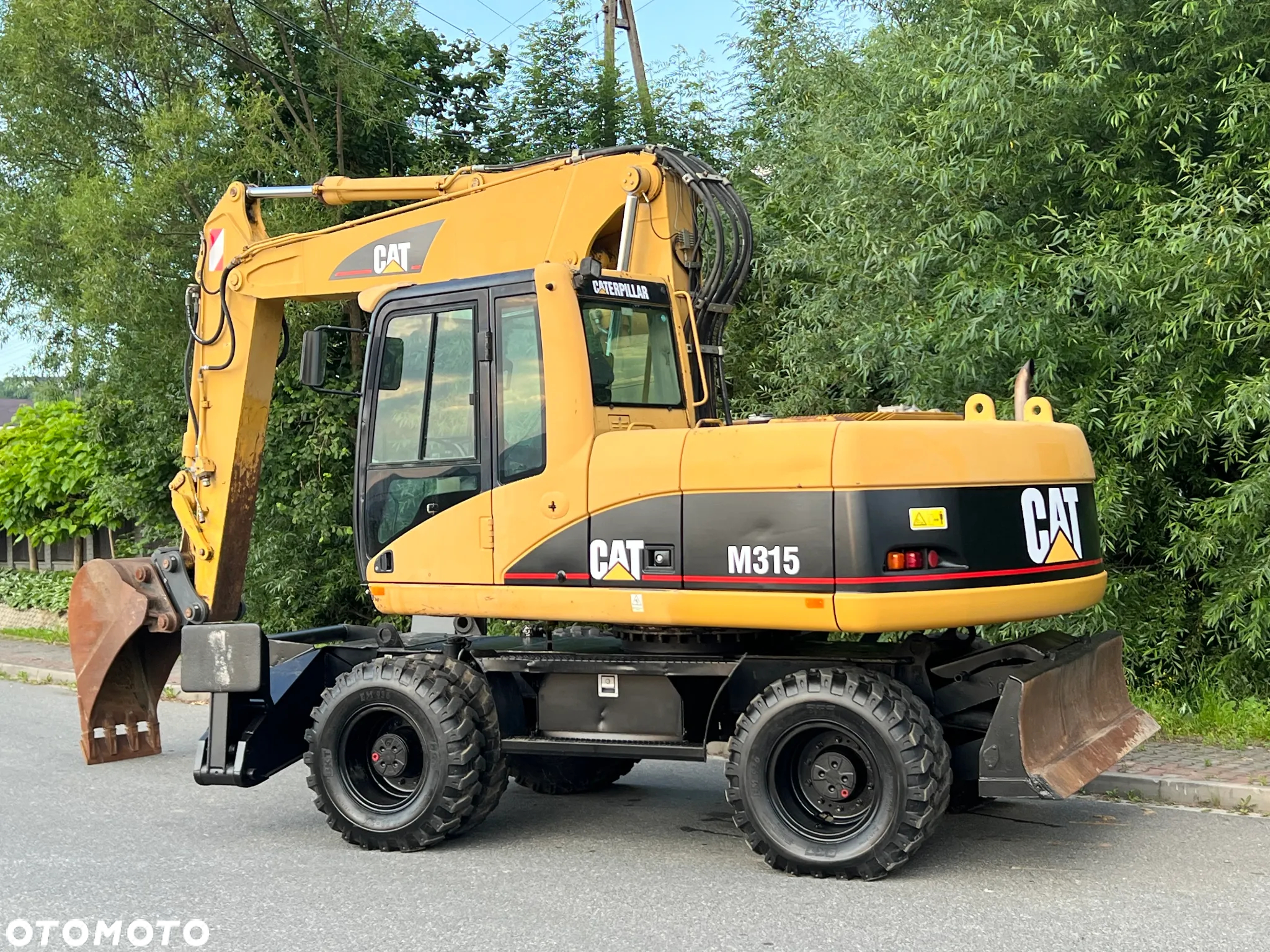 Caterpillar CAT M315C  CATERPILLAR SPROWADZONY  Bardzo Dobry Stan - 34