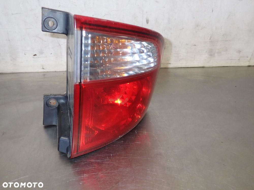 LAMPA LEWA TYLNA SSANGYONG KYRON 83601-09 - 1