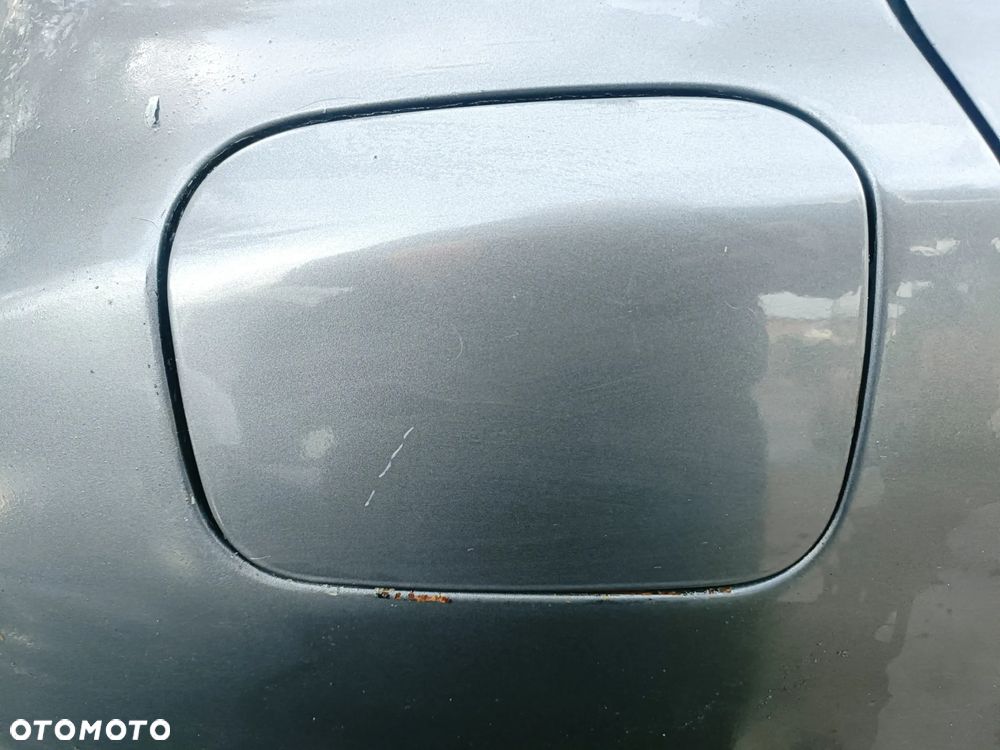 NISSAN MICRA III K12 5D 03-07 2005 r. KY5 klapka wlewu paliwa  * - 1