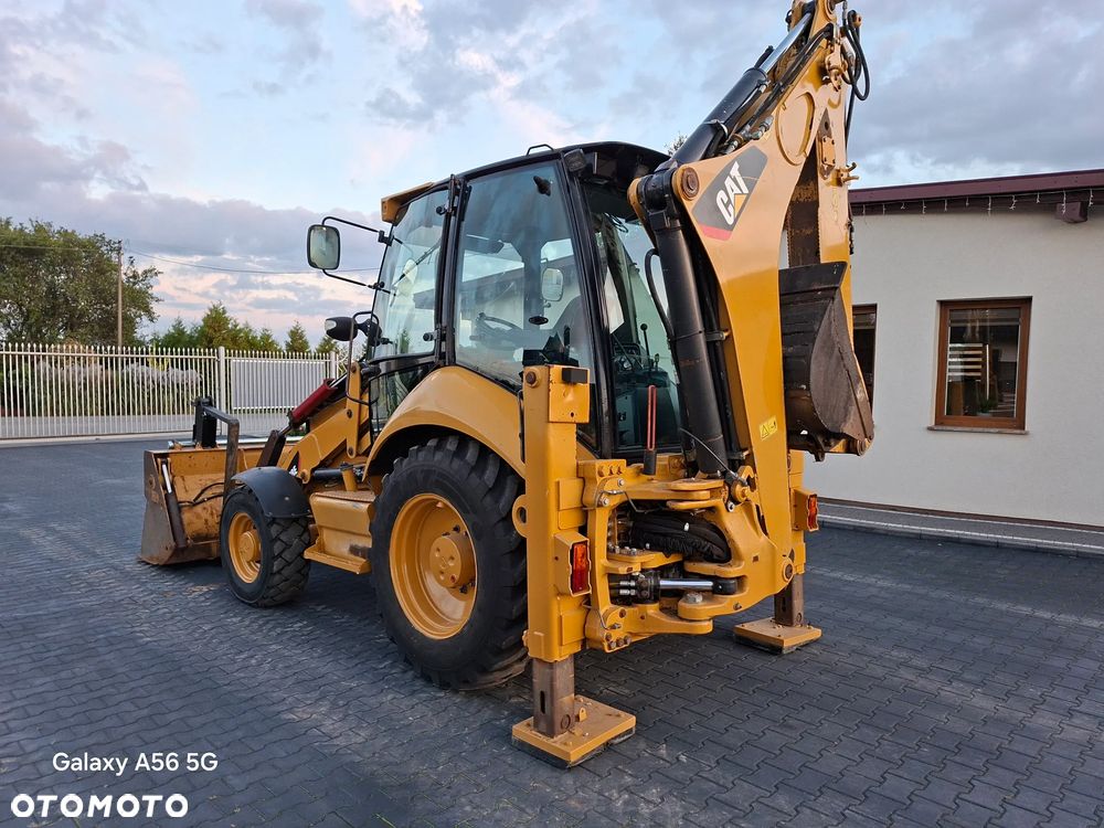 Caterpillar CAT 428E - 4