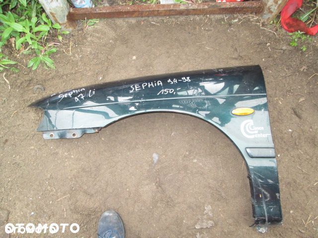 BŁOTNIK KIA SEPHIA 94-98 LEWY - 1