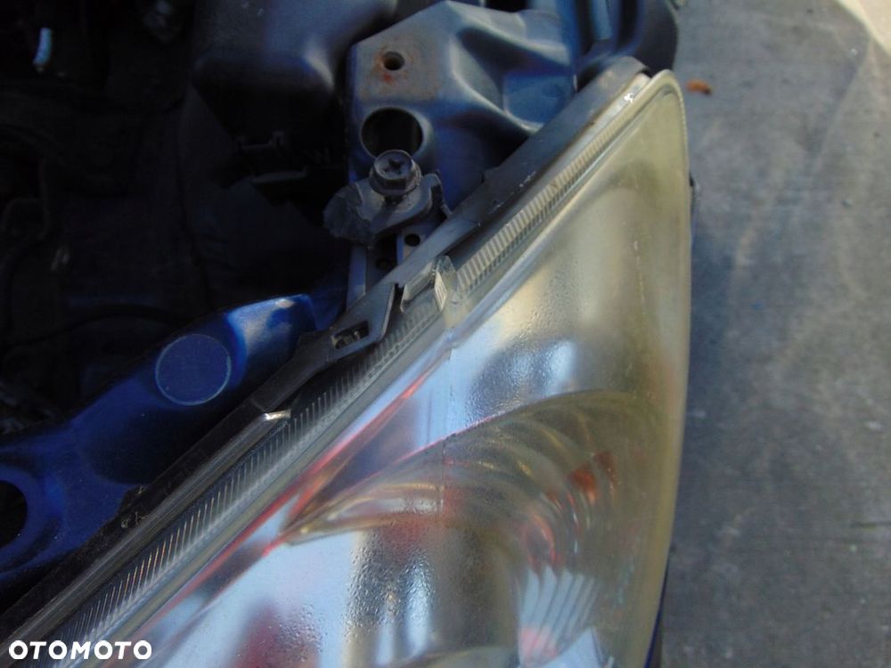 LAMPA PRZÓD PRZEDNIA LEWA TOYOTA COROLLA E12 LIFT FL EUROPA - 2