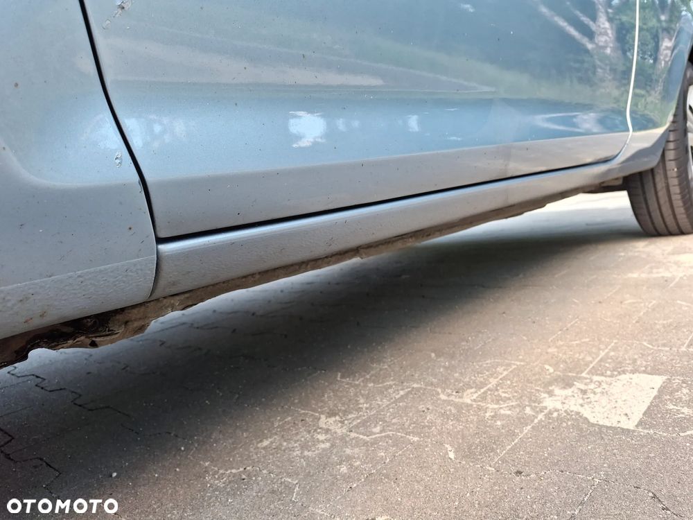Opel Corsa 1.4 16V Cosmo - 13