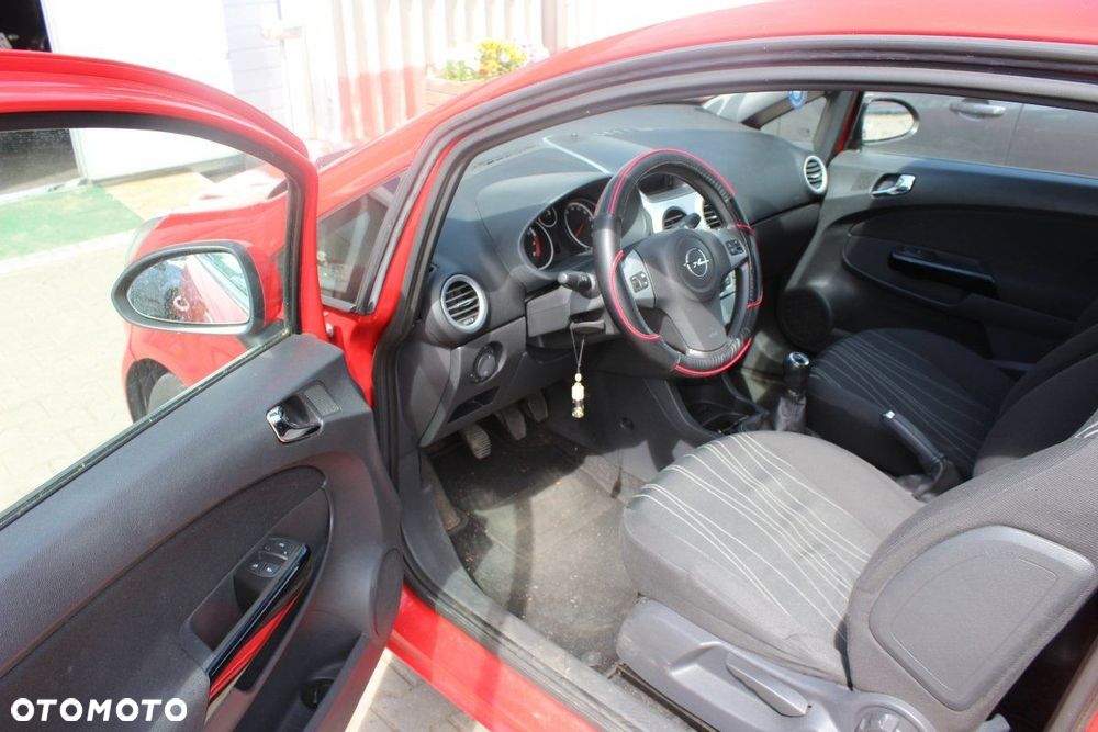 Opel Corsa D 2009 1.2i Z12XEP HB3D (MASKA, ZDERZAK, LAMPA, BŁOTNIK, DRZWI, SZYBA, FOTEL) - 7