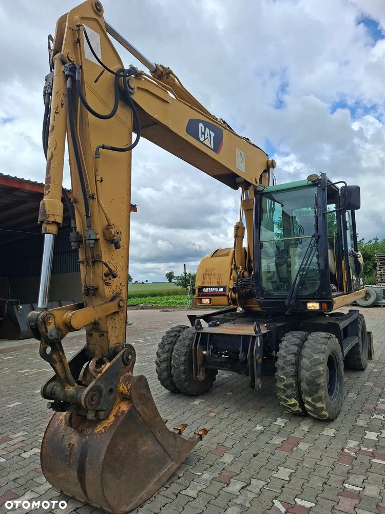 Caterpillar M316C - 1