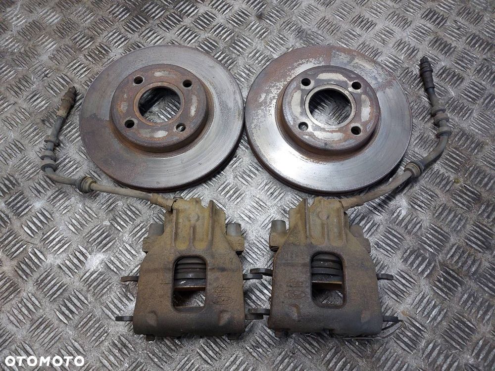 TARCZE HAMULCOWE PRZÓD + KLOCKI + ZACISKI FORD FOCUS MK1 1.6 16V - 1