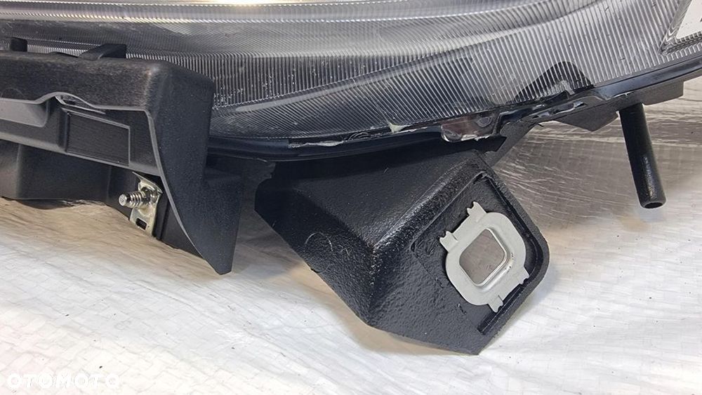 Opel Combo D lampa lewa przód przednia 520868580E - 4
