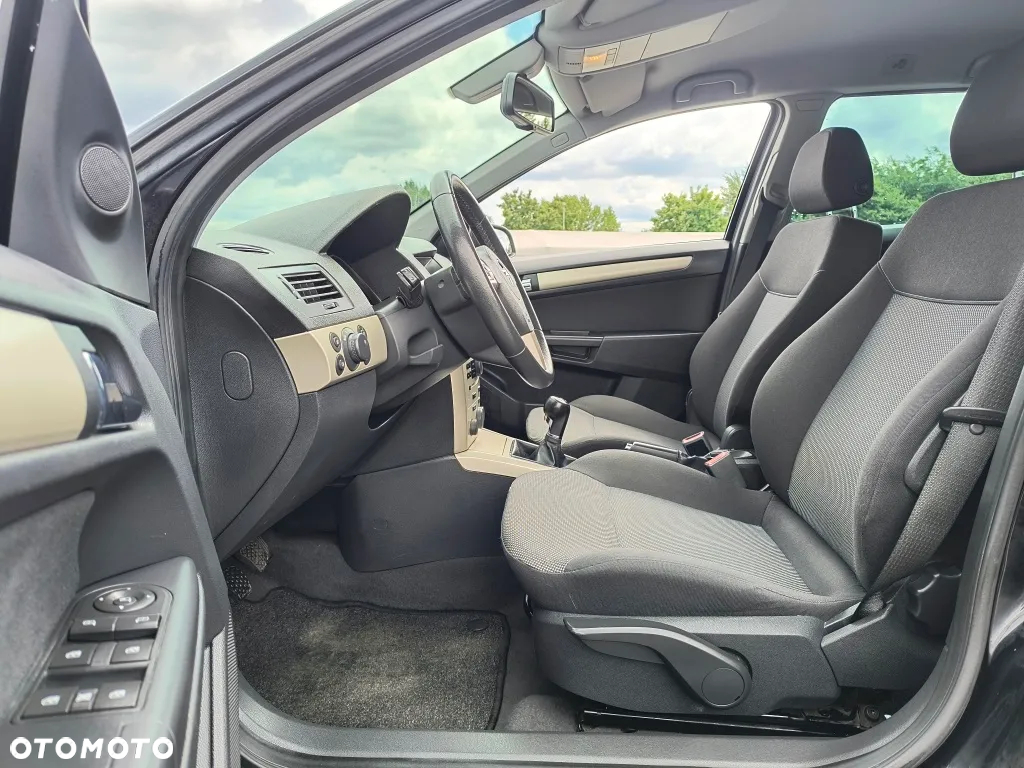 Opel Astra 1.8 Caravan Edition - 7