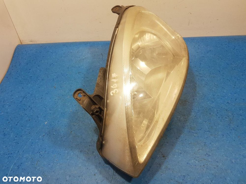 OPEL CORSA C REFLEKTOR LEWY - 2