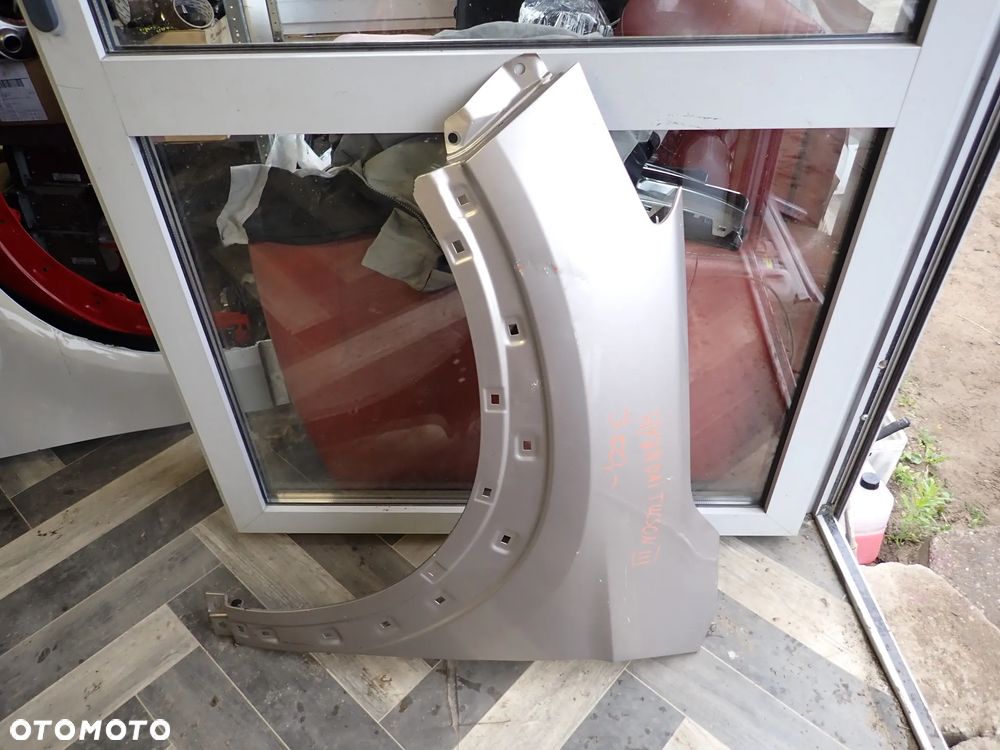 HYUNDAI TUCSON III BŁOTNIK LEWY PRZÓD - 1