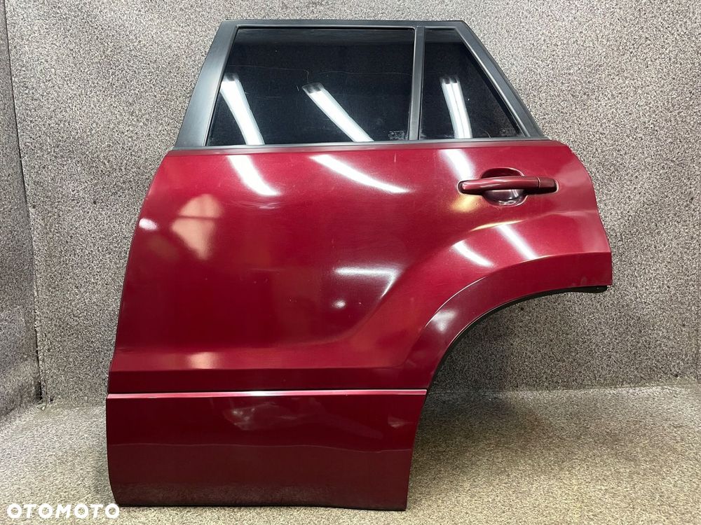 Drzwi lewy tyl lewe tylne listwa szyba ZY8 C13 Suzuki Grand Vitara 2 II - 2