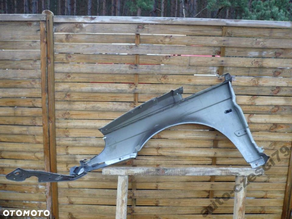 Saab 95 LIFT blotnik przedni przod prawy R B32 - 2