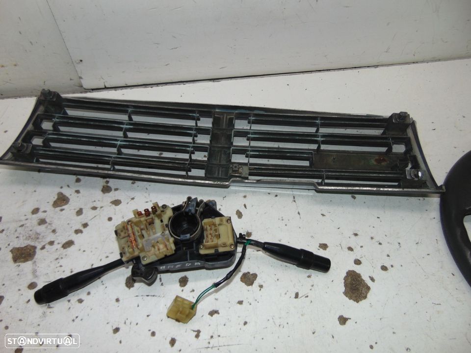 Mazda 929 grelha/Volante - 11