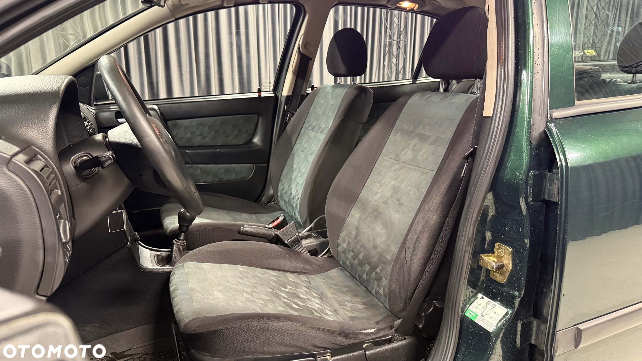 Opel Astra 1.6 16v 100 - 12