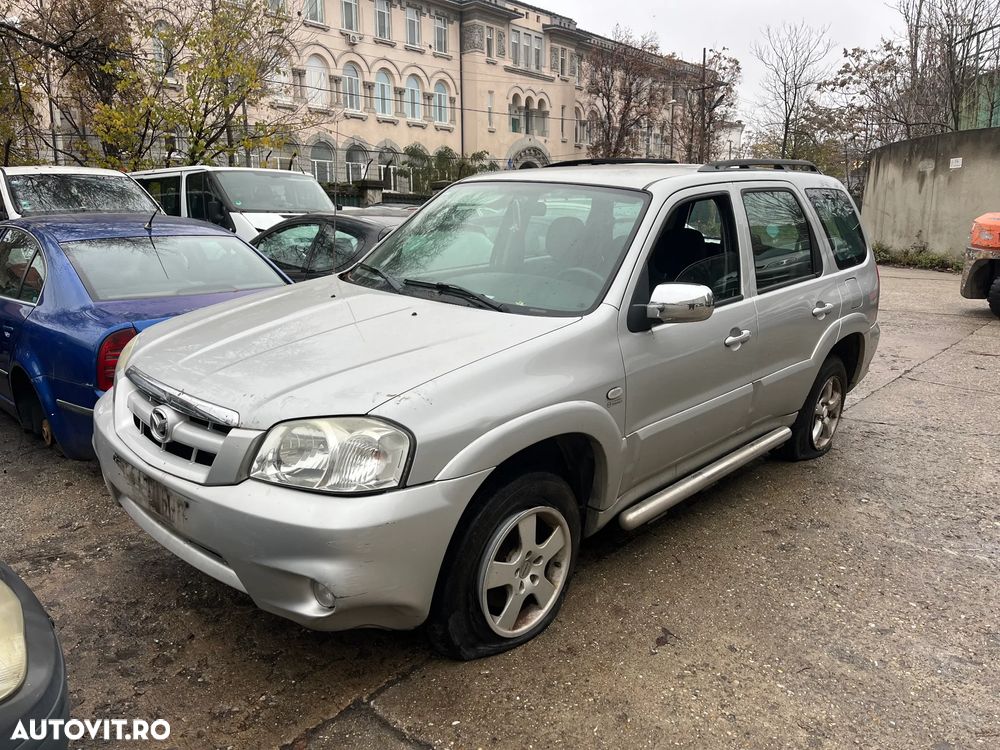 Dezmembrez Mazda Tribute 2002 gri argintiu benzina