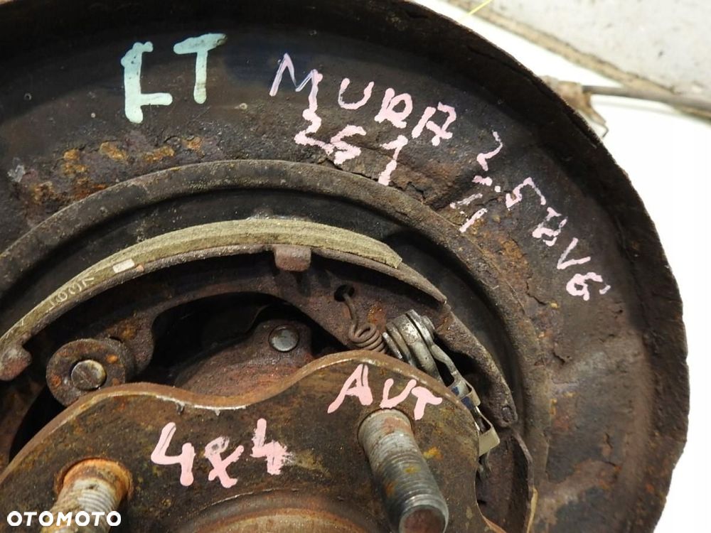 PIASTA ZWROTNICA LEWY TYŁ NISSAN MURANO Z51 3.5 V6 - 2