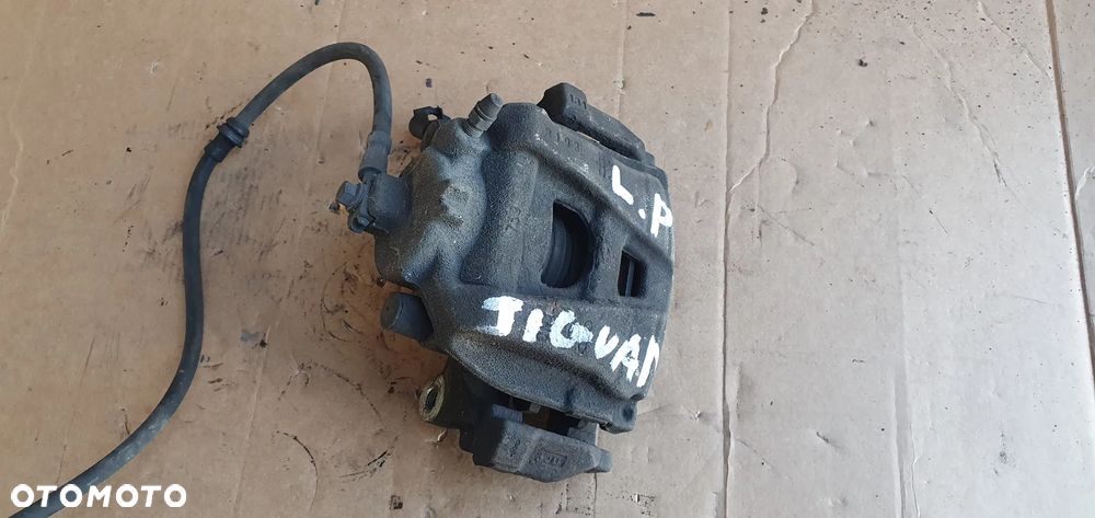 Zacisk hamulcowy lewy przód przedni VW Tiguan I Lift 2.0 TDI - 2